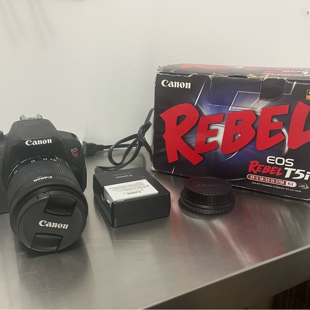 Canon EOS Rebel T5 DSLR Camera Kit in Black and Red Box Accents